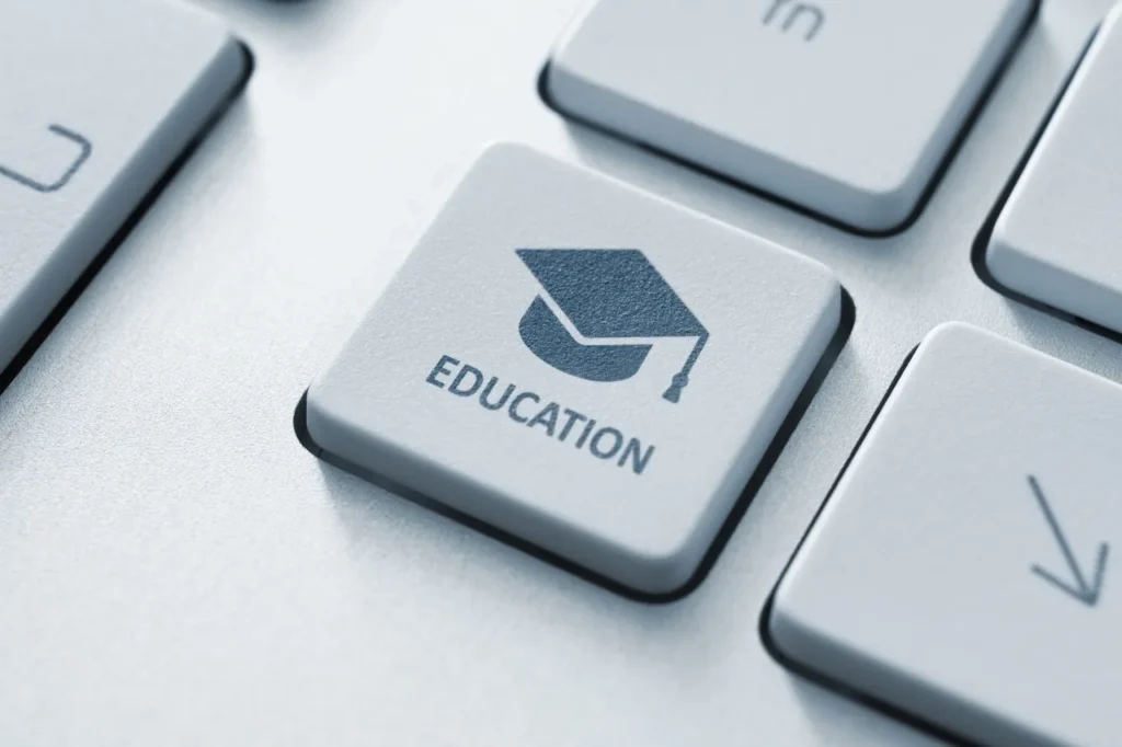A keyboard key labeled 'Education' with a graduation cap icon.